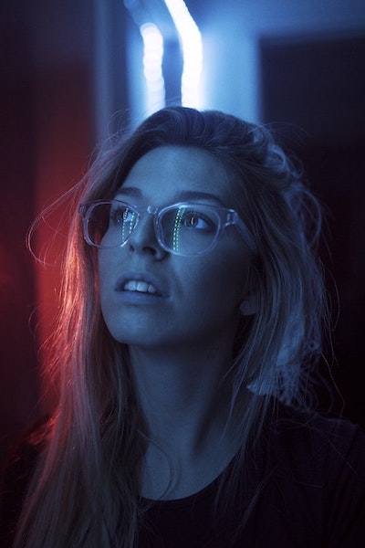 blonde woman with glasses