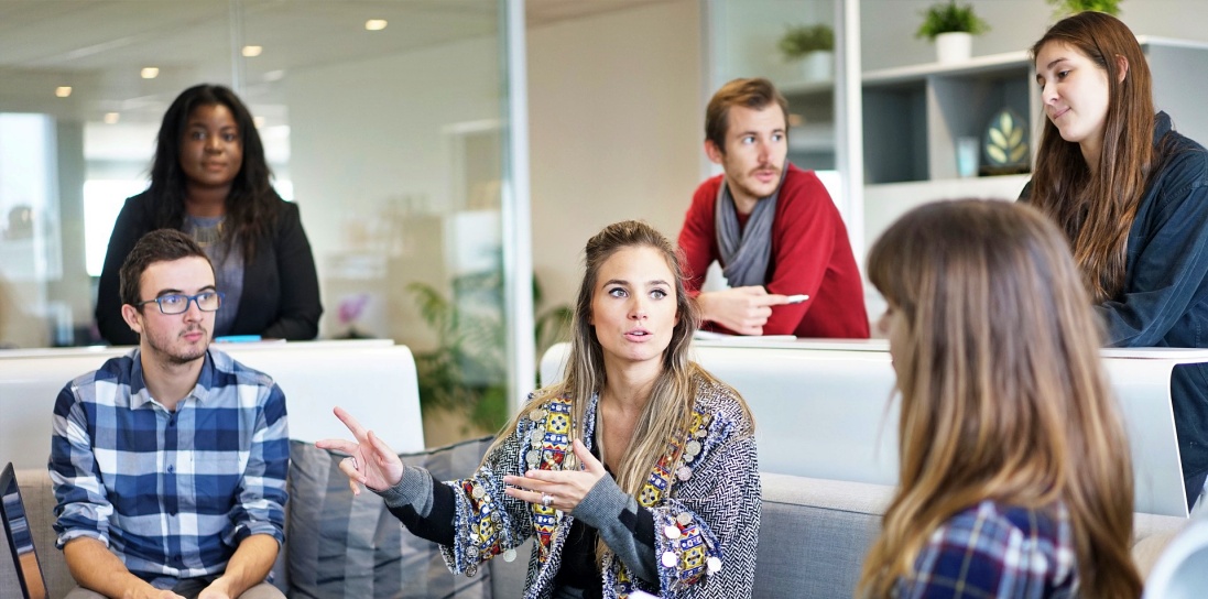 People sitting at a table discussing