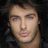 brunette man with blue eyes